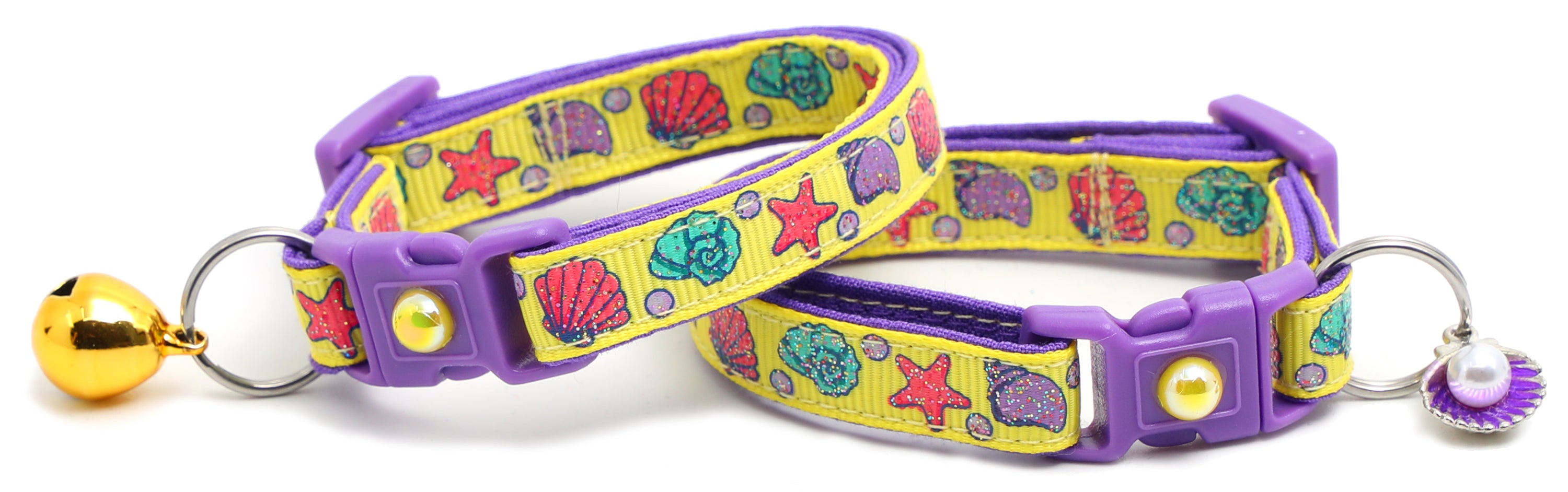 Beachcomber Breakaway Cat Collar in vibrant colors, featuring a breakaway clip and removable bell, made from soft reinforced cotton.